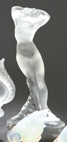Lote 1460
"Desnudo Femenino" de cristal de Lalique.
Parcialmente transparente y parcialmente translúcido. Firmada en la base.