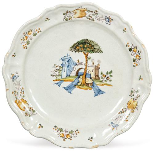 Lote 1486
Plato de cerámica pintada y esmaltada, serie del Chaparro de Talavera.
S. XVIII