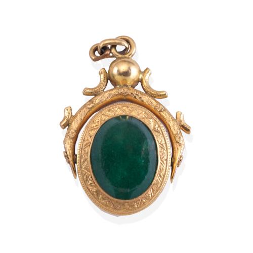 Lote 2295
Colgante tipo sello con cuarzo aventurina en montura de oro amarillo de 18K.