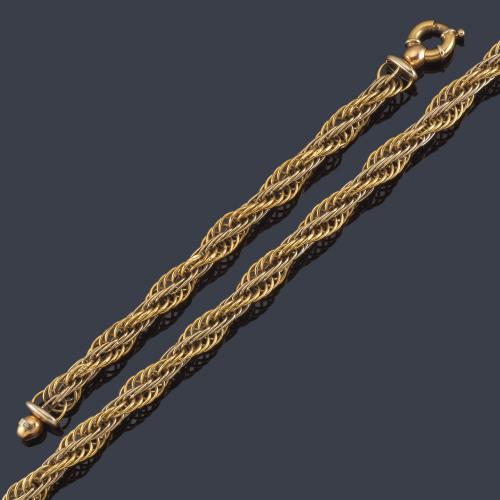 Lote 2471
Collar y pulsera tipo cordón en oro amarillo de 18K.