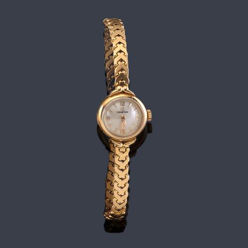 Lote 2550
OMEGA de señora con caja y brazalete en oro rosa de 18 K.