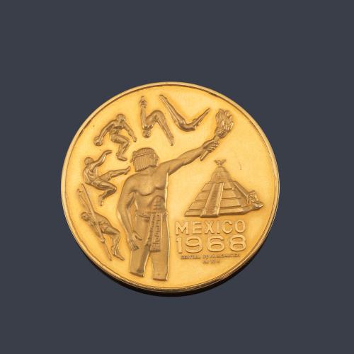 Lote 2600
Moneda conmemorativa México 1968 en oro de 22 K.