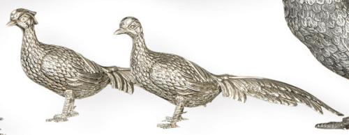 Lote 1112
Pareja de faisanes de plata española punzonada 1ª Ley.