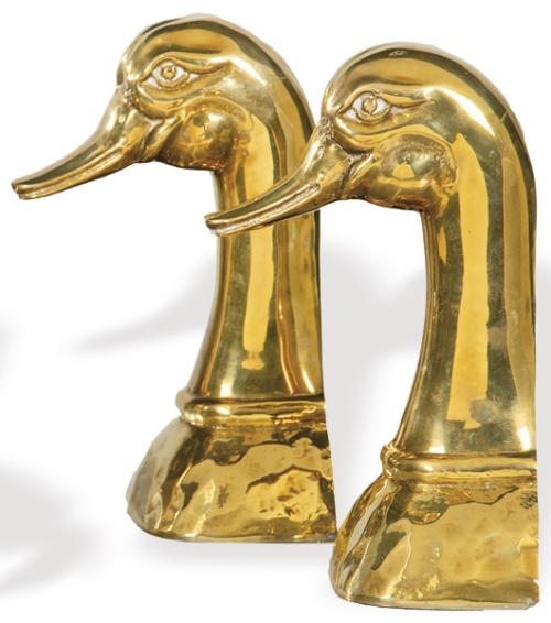 Lote 1430
Pareja de sujetapuertas "Cabeza de Pato" de bronce de Almazán h. 1960-70.