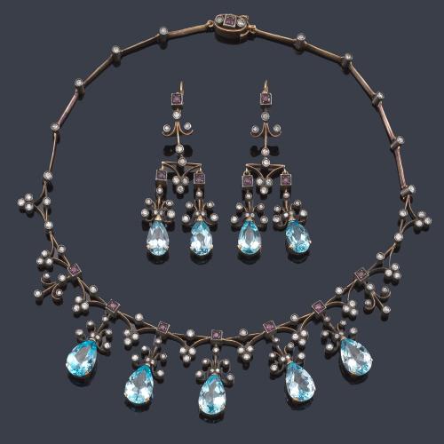 Collar y pendientes época Victoriana con topacios talla perilla, diamantes talla rosa y rubíes. S. XIX.