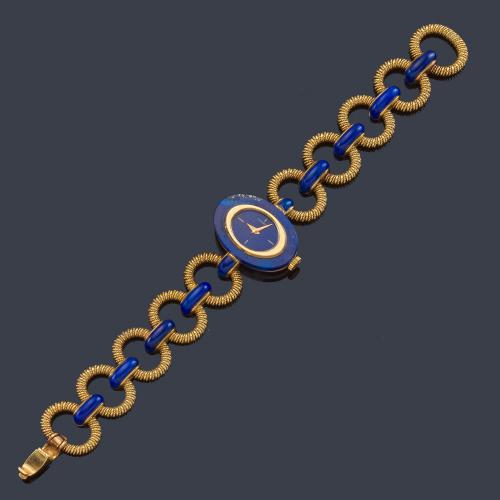  Precioso reloj Longines en oro amarillo de 18 K y lapislázuli, años 70.