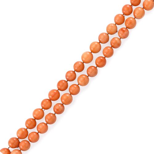  Collar largo con cuentas de coral de aprox. 11,23 - 10,87 mm con cierre circular gallonado en oro amarillo de 18K.