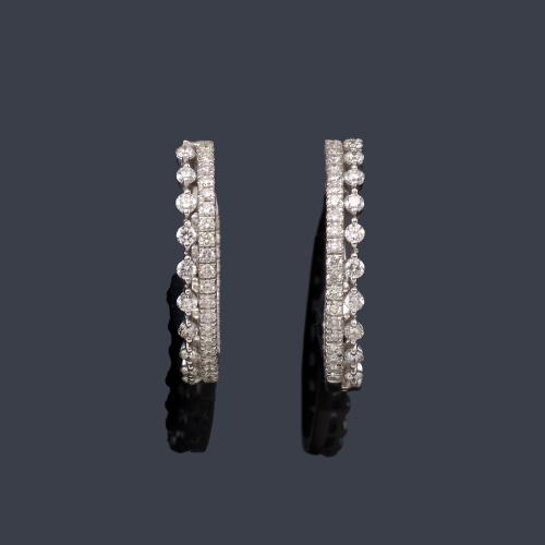  Criollas con doble banda de brillantes de aprox. 1,11 ct en total.