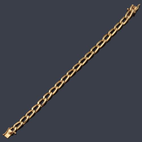  Pulsera con eslabones en montura de oro amarillo de 18K.