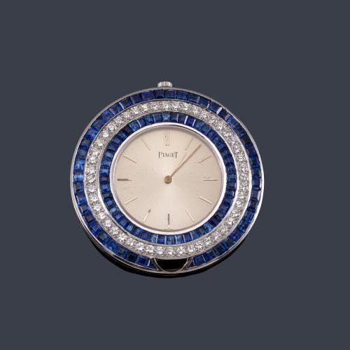  PIAGET, reloj joya de colgar con caja en oro blanco de 18 K con brillantes y zafiros calibrados.