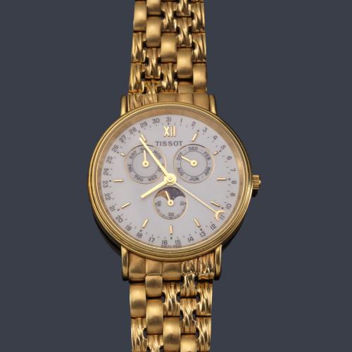  TISSOT Triple Calendario y fase luna de caballero con caja y brazalete en oro amarillo de 18 K.