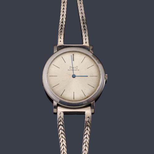 PIAGET de caballero con caja  y brazalete en oro blanco de 18 K.