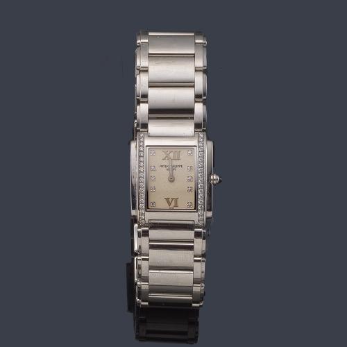 PATEK PHILIPPE Twenty- 4  ref. 4910/10 de señora con caja y brazalete en acero y brillantes.