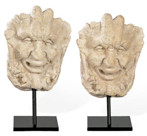  Pareja de máscaras de sátiros en caliza
