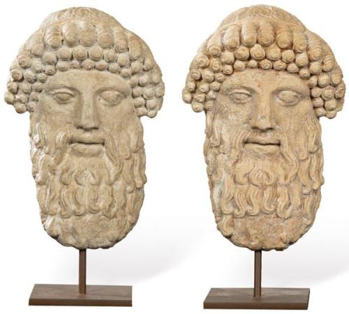  Pareja de cabezas de asirios en caliza para jardín.