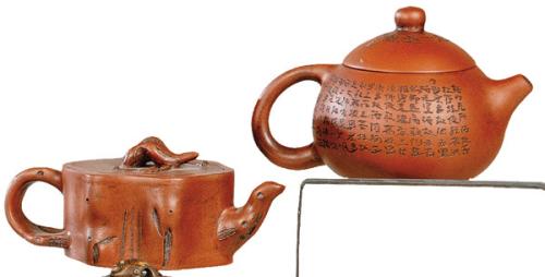  Dos teteras (zisha)  de cerámica Yixing (buccaro) S. XX.