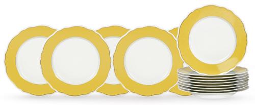  Juego de 15 platos en porcelana esmaltada y vidriada de Limoges, Philippe Deshoulieres. Alero en amarillo y perfil dorado.