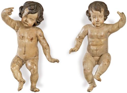  Pareja de amorcillos barrocos en madera tallada y policromada, España S. XVIII.