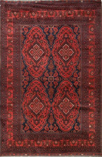  Alfombra persa en tonos rojos