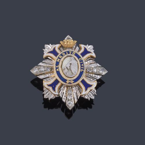 Insignia solapa de la Gran Cruz al Mérito Civil en oro amarillo de 18 K. esmalte y diamantes. Con estuche.
