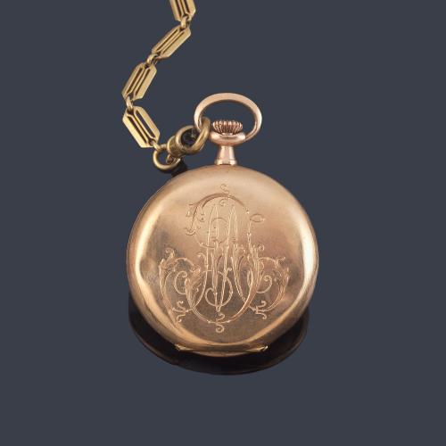 Reloj de colgar con caja en oro rosa de 14 K con leontina en oro amarillo de 18 K.