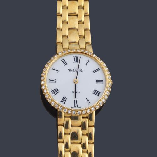  PAUL PICOT de señora con caja y brazalete en oro amarillo de 18 K y orla de brillantes.