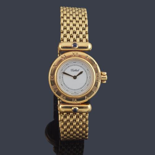 TABBAH de señora con caja y brazalete en oro amarillo de 18 K. 