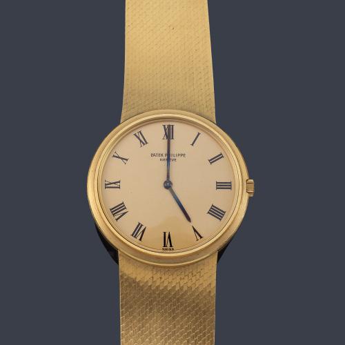  PATEK PHILIPPE Calatrava ref. 3591/2 de caballero con caja y brazalete en oro amarillo de 18 K, circa 1973.