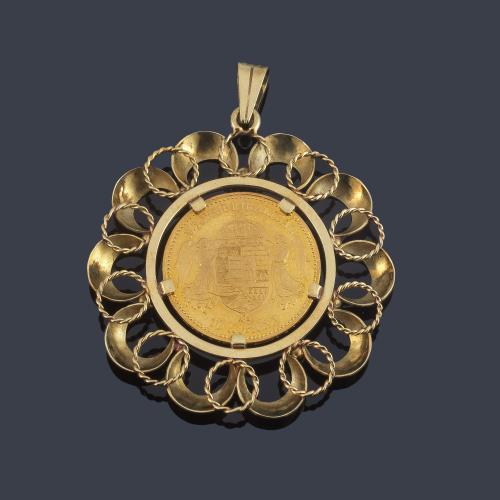 Broche moneda conmemorativa "Aureus Magnus" en oro amarillo de 22 y. Marco en oro amarillo de 18 K.