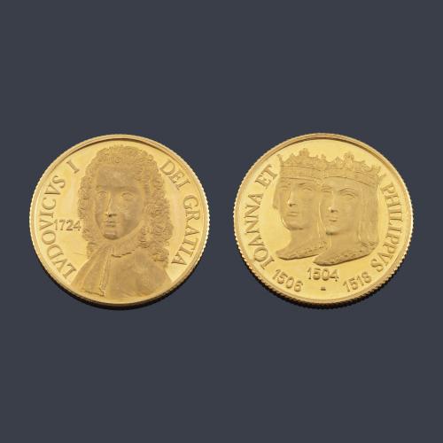 Dos monedas conmemorativas Reyes en oro de 22 K con estuche y certificado.