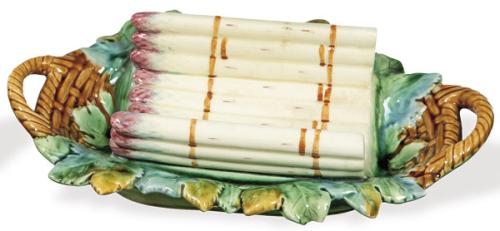  Fuente para espárragos en forma de cesta con hojas en cerámica pintada y esmaltada con marca de fábrica GR en la base. Dos piquetes en el reverso.