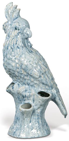 Florero en forma de figura de loro en cerámica esmaltada en azul y blanco de Bassano.