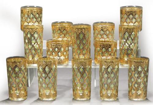  Juego de ocho vasos altos y seis de wisky de cristal americano Culver, modelo Valencia con decoración aplicada de oro de 24 kilates y rombos tallados y esmaltados en verde h. 1950.