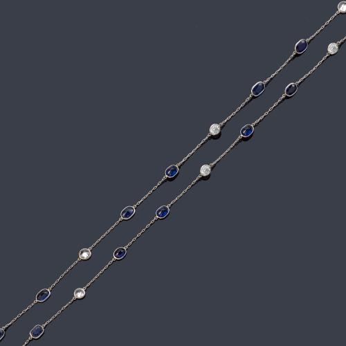 Cadena larga con brillantes de aprox. 5,00 ct en total intercalado con zafiros talla rectangular en montura de platino.