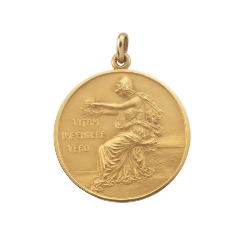 Colgante medalla Minerva de la Universidad de Buenos Aires en oro de 18 K.