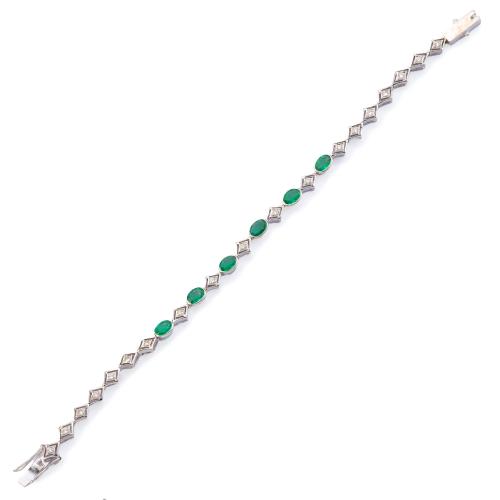 Pulsera con seis esmeraldas talla oval de aprox. 1,20 ct con brillantes de aprox. 0,60 ct en total.