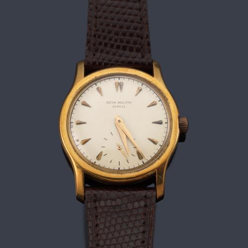 PATEK PHILIPPE ref. 2450 de caballero con caja en oro amarillo de 18 K.