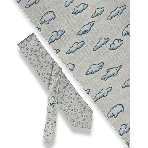 Corbata Hermès,Nubes con forma de animales sobre fondo gris.