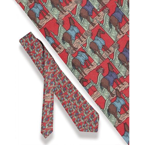Corbata Hermés, caballos en cuadra sobre fondo coral.