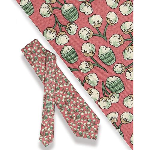 Corbata Hermes, planta del algodón con fondo rosa.