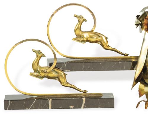Pareja de sujetalibros Art Deco de bronce dorado con gacelas h. 1920-30.