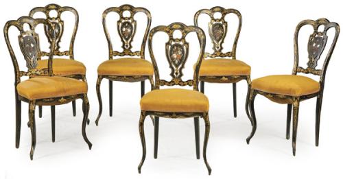 Conjunto de 6 sillas isabelinas, en madera lacada en negro y decoración pintada de motivos vegetales. España, segunda mitad S. XIX