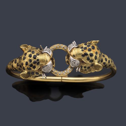 Pulsera rígida con doble cabeza de leopardo decorado con esmalte negro y brillantes.