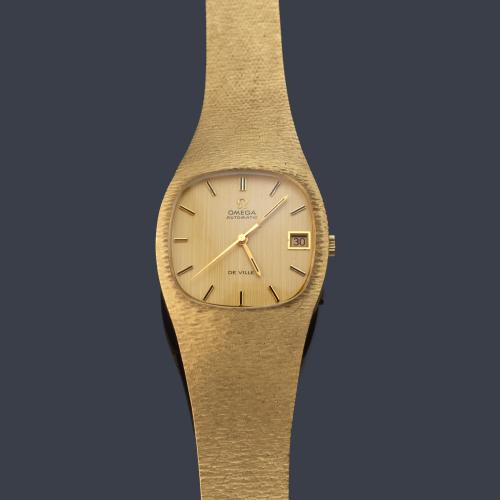 OMEGA De Ville de caballero con caja y brazalete en oro amarillo de 18 K.