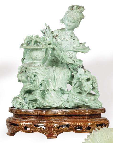 Figura de mujer en turquesa