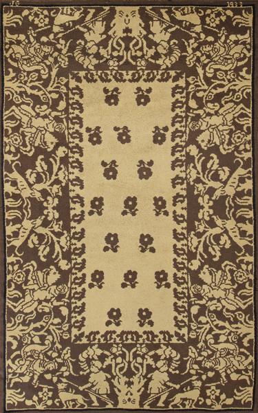 Alfombra española en lana firmada JG y fechada 1933.