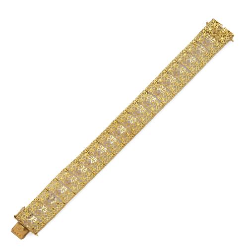 Pulsera con diseño calado en oro amarillo mate y brillo de 18K.