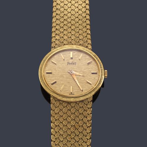 PIAGET ref. 9801 P5 de señora con caja y brazalete en oro amarillo de 18 K.