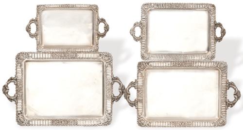 Juego de cuatro bandejas rectangulares con asas de plata española punzonada 1ª Ley de Espuñes,