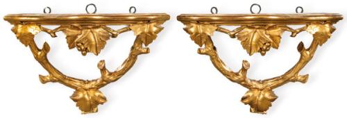  Pareja de ménsulas de madera tallada, estucada y dorada S. XX.